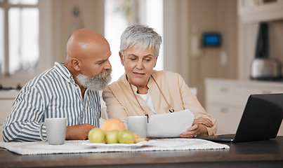 Image showing Laptop, document and senior couple in discussion at home for paying bills debt or mortgage online. Pension planning, technology and elderly man and woman in retirement with paperwork and a computer.