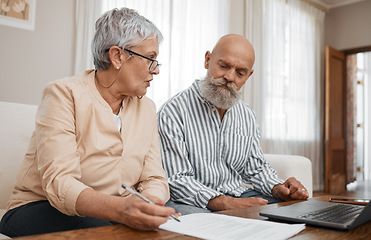 Image showing Budget, documents and senior couple with laptop planning financial investments, mortgage or tax papers. Elderly woman speaking of bills, debt and pension fund on bank statement to an old man at home