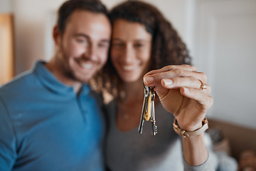 Image showing Hand, success or happy couple with house keys in real estate, property investment or buying apartment. New home blur, goal or excited man with smile or woman to celebrate moving in flat together