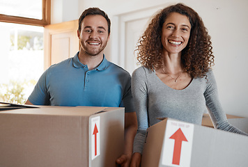 Image showing Moving, new home or portrait of happy couple with boxes in real estate, property or rental apartment. Woman, proud man or excited people carrying or lifting package in a house on loan with smile