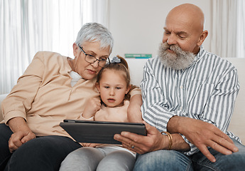 Image showing Relax, kid or grandparents with tablet for elearning or studying for education or remote learning at home. Family, grandfather or grandmother with girl reading ebook or streaming videos or movies