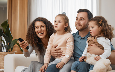 Image showing Kids, mother or father watching tv to relax or bond as a happy family in living room in Canada with love. Television, sofa or parents smile with children siblings enjoying film or movies on holiday