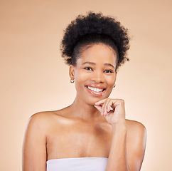 Image showing Face, skincare and beauty of black woman, happy and isolated on a brown background in studio. Portrait smile, natural cosmetics and African model in facial treatment for aesthetic, wellness or health