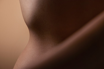 Image showing Healthy, skin and body of woman closeup for beauty, cosmetics or wellness in brown background in studio. Skincare, texture and glow from dermatology, self care or natural treatment in salon or spa