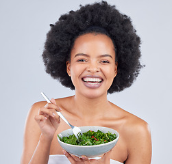 Image showing Health, portrait and black woman with a salad in studio for diet dinner, lunch or supper. Happy, wellness and young African female model eating vegetables for vegan snack or meal by white background.