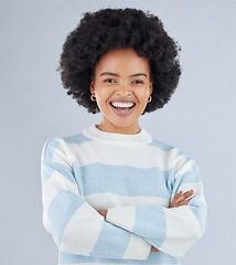 Image showing Fashion, arms crossed and smile with portrait of black woman in studio for education, casual and trendy style. Happy, pride and confidence with person on white background for college, future or gen z