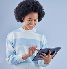 Image showing Woman, tablet and smile on studio background for social media post, reading ebook and search website. Happy african model scroll on digital technology for connection, download app and online shopping