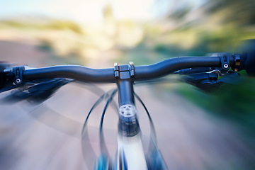 Image showing Fast, blur and a bicycle in nature for cycling, fitness or training for a marathon. Speed, road and a bike in motion for sports, triathlon or exrcise in the countryside while moving for cardio