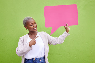 Image showing Black woman, speech bubble and thinking for pointing, space or mockup with opinion by green wall background. African girl, billboard and paper poster for voice, vote and social network for feedback