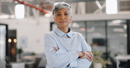 Image showing Senior business woman, arms crossed and portrait with leadership, confidence and pride for career. Mature ceo lady, serious face and management job at startup, modern office or professional workplace