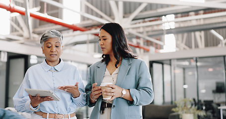 Image showing Mentor, tablet and senior woman with employee, talking and walking in office for online research. Business women, administrator or mature manager in conversation for schedule on website in workplace