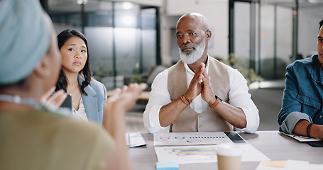 Image showing Senior black man, boss or meeting with business people in collaboration for project planning in office. Team discussion, employees or African CEO with paperwork listening to ideas or feedback review