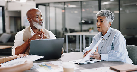 Image showing Laptop, documents and meeting with a business team in the boardroom for planning or strategy. Teamwork, collaboration and management with a man and woman employee group working on the company vision