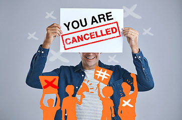 Image showing Man, cancelled sign and protest, censorship and bullying in studio isolated on a white background overlay. Poster, cancel culture and happy crowd ban influencer on social media for freedom of speech