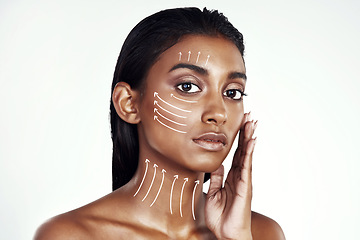 Image showing Plastic surgery portrait, arrow lines and woman touch beauty filler results, facial transformation change or anti aging wellness. Aesthetic face lift, spa studio or Indian patient on white background