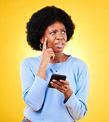 Image showing Confused, thinking and black woman with mobile for a chat, communication or an app. Website, contact and an African girl with doubt about an online message or web notification on a yellow background