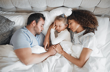 Image showing Top view, family and parents with child in bed for bonding, healthy relationship and sleeping at home. Morning, love and above of mother, father and girl in bedroom asleep for comfort, cuddle or love