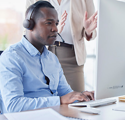 Image showing Black man, training and call center support, planning or communication, telemarketing and computer advice. Consultant, agent or manager on desktop for business help, collaboration and online teamwork