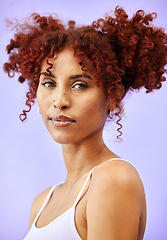 Image showing Beauty studio, portrait and woman with hair dye results of curly hairstyle treatment, natural cosmetics or self care wellness. Face makeup, hairdressing salon and ginger model on purple background