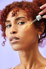 Image showing Skincare, portrait and woman with face serum in a studio for natural, beauty and cosmetic routine. Self care, health and female model from Colombia with facial oil for hydration by purple background.