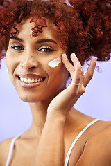 Image showing Skincare, studio portrait or happy woman with cream, self care results or SPF sunscreen, lotion or skin hydration. Facial routine, face cosmetics or person with dermatology creme on purple background