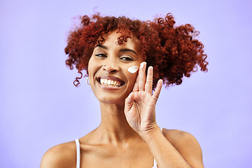 Image showing Skincare, studio portrait or happy woman with cream lotion for self care, skin protection or facial hydration. Anti aging routine, happiness or person with face cosmetic ointment on purple background