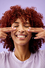 Image showing Happy, hair and woman hands on face in studio for natural, cosmetic or wellness on purple background. Haircare, beauty and lady model smile for red afro growth, texture or dye satisfaction results