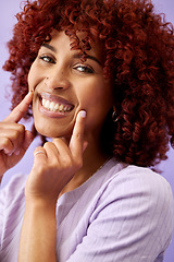 Image showing Hair, beauty and woman with hands on face in studio for natural, cosmetic or wellness on purple background. Haircare, portrait and lady model smile for red afro growth, texture or dye satisfaction