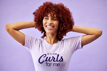 Image showing Hair care, face and black woman with natural afro and hand on head for growth, glow and shine in studio on purple background. Wellness, person and healthy texture of cream and argon oil cosmetics