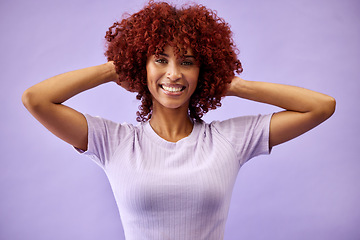 Image showing Beauty, portrait and woman with natural hair in studio for cosmetics, fun or self care on purple background. Haircare, smile and face of lady model with red afro, dye and color texture satisfaction