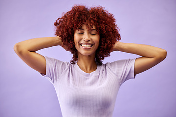 Image showing Beauty, smile and woman with natural hair in studio for cosmetic, fun or care on purple background. Happy, haircare and face of lady model with red afro, dye and color, texture or growth satisfaction