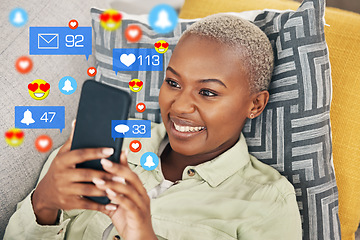 Image showing Black woman on sofa with phone, and emoji on social media, chat or video online in home. Happy face, smile and internet, girl on couch with connectivity on smartphone and funny viral meme or post.
