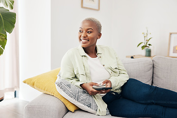 Image showing Woman, happy and thinking with phone on sofa to relax with social media, digital contact and user connection. African person, smartphone and idea for mobile blog, search subscription and app at home