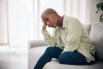 Image showing Woman, thinking and anxiety on sofa for sad memory, mental health or depression of debt, crisis or fail. Frustrated, lonely and african person remember trauma of abuse, broken heart or stress at home