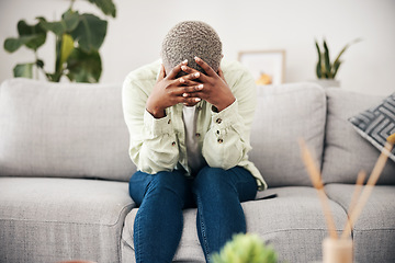 Image showing Woman, headache and depression on sofa for mental health, anxiety and stress of bad mistake at home. Crying, sad and frustrated african person scared of trauma, worry and counselling of broken heart