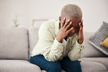 Image showing Stress, headache and vertigo with a black woman on a sofa in the living room of her home for mental health. Anxiety, burnout or pain and a young person in an apartment with depression or a migraine