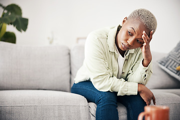 Image showing Woman, depression and thinking in home of pain, mental health or anxiety of debt, regret or risk. Stress, worry and frustrated african person with headache of sad trauma, broken heart or ptsd on sofa