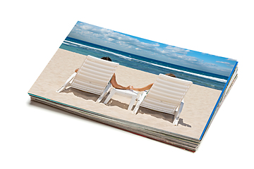 Image showing Stack of vacation photos isolated