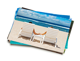 Image showing Stack of vacation photos isolated