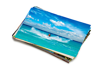 Image showing Stack of vacation photos isolated