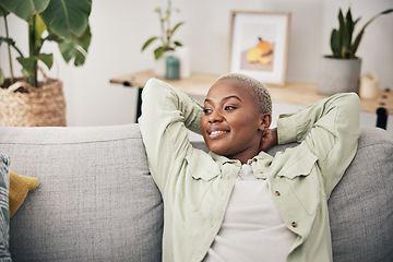 Image showing Black woman, relax and calm stretching on sofa in home, living room and lounge with peace, happiness and rest on weekend. Happy, face and mindset of freedom in new house or apartment with homeowner