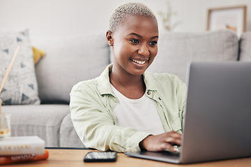 Image showing Black woman, laptop and remote work in living room for elearning, subscription info and social media. Happy freelancer typing on computer to search internet website, online shopping and reading blog