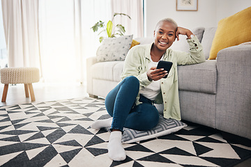 Image showing Happy woman, portrait and smartphone typing on floor in lounge for social media post, search contact or download mobile games. African person, cellphone user and subscription on digital app at home
