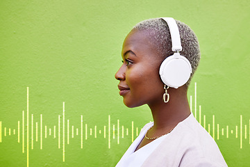 Image showing Radio headphones, profile and black woman listening on green wall background mockup space. Music, audio and African person streaming podcast, overlay and hearing sound of jazz media on technology.