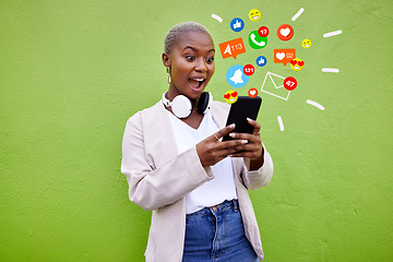 Image showing Surprise, black woman and reading phone emojis, social media icons and wow facial expression for networking notification. App opinion, cellphone communication or shocked user on green background wall