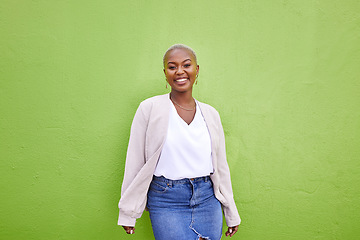 Image showing Portrait, fashion and happy black woman on green wall background mockup space. Positive designer, smile and confident African person in style, casual clothes and trendy aesthetic in Nigeria outdoor