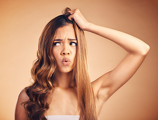 Image showing Hair, frustrated and upset woman with beauty and frustrated from salon treatment and Brazilian fail. Studio, brown background and model with damage from split ends and shock of bad and messy haircut