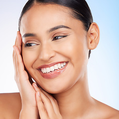 Image showing Skincare, thinking and woman with cosmetics, smile and dermatology on a blue studio background. Ideas, person and happy model with luxury, cosmetology and facial with aesthetic, beauty and wellness