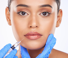Image showing Face, lip filler and dermatology, woman and beauty with doctor and plastic surgery on white background. Portrait, cosmetic treatment and liquid collagen, needle syringe and wellness in a studio
