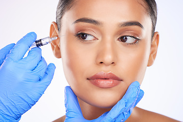 Image showing Hands, beauty and a woman with botox on a white background thinking of plastic surgery. Idea, cosmetic and a person with a doctor for skincare, dermatology or an injection for wellness or face